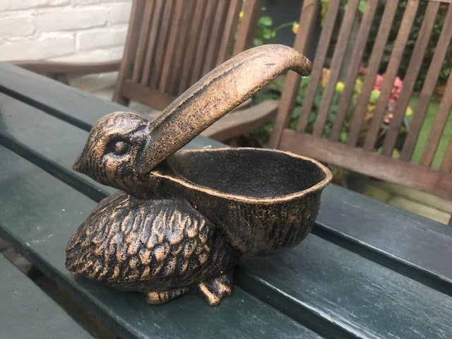 gietijzeren houder/beeld , PELIKAAN, Beschilderd, Minder dan 20 cm, Ophalen of Verzenden, Beeld