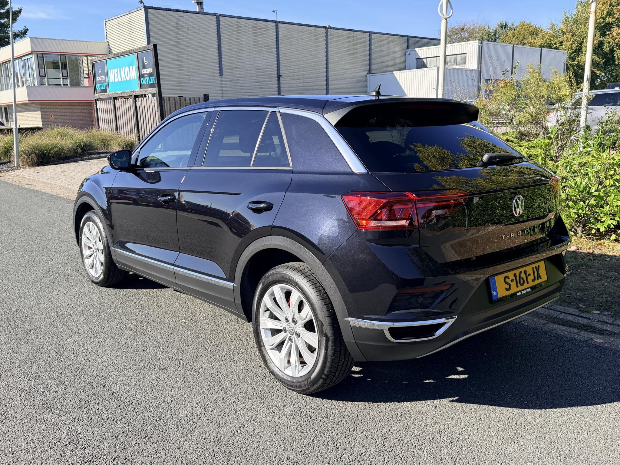 Volkswagen T-Roc 1.5 TSI Sport 150PK DSG•Navi•ACC, 4 cilinders, 150 pk, Zwart, Bedrijf