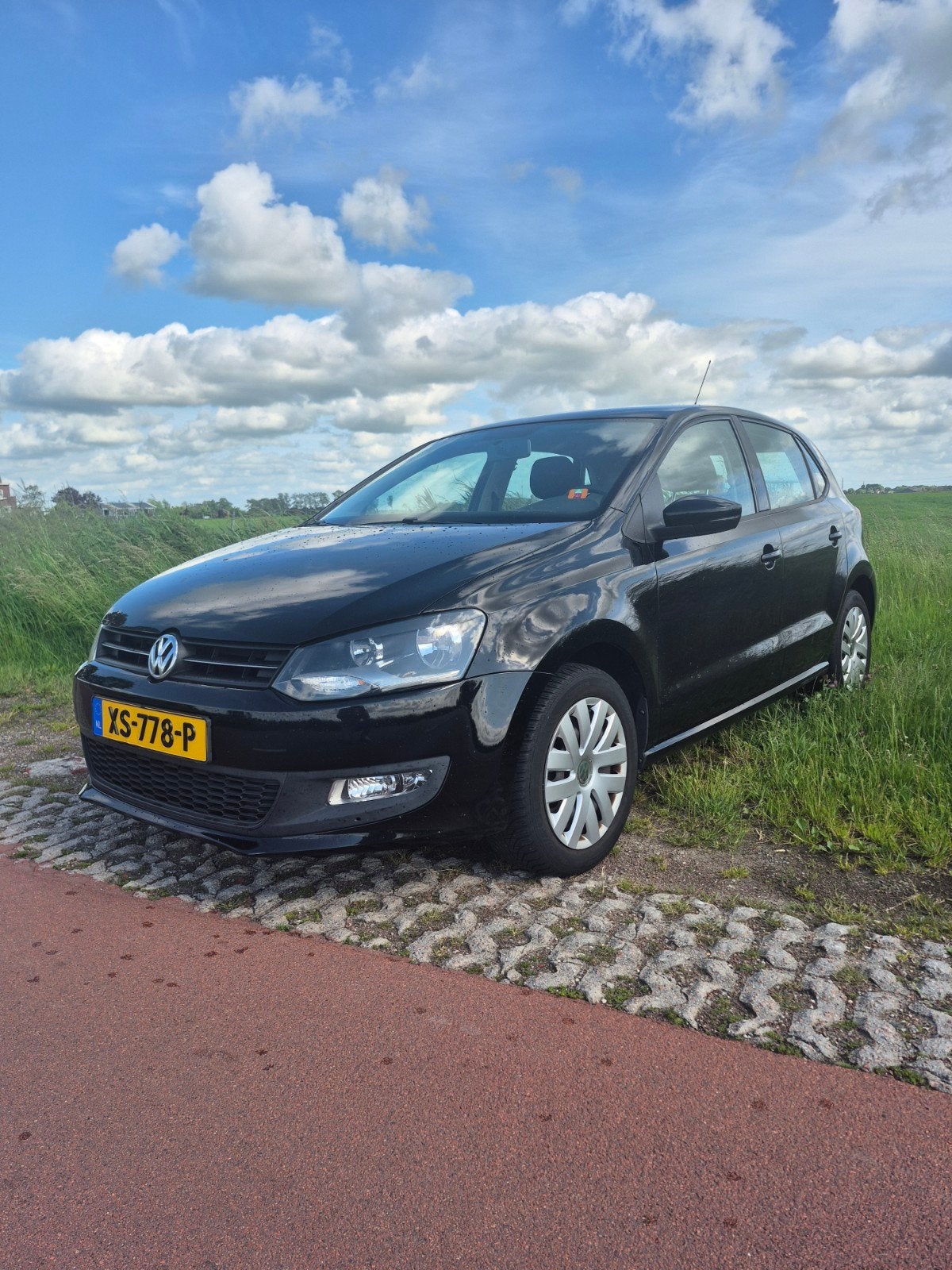 Volkswagen Polo 1.2 51KW 2010 Zwart, Voorwielaandrijving, Euro 5, 40 €/maand, 1198 cc