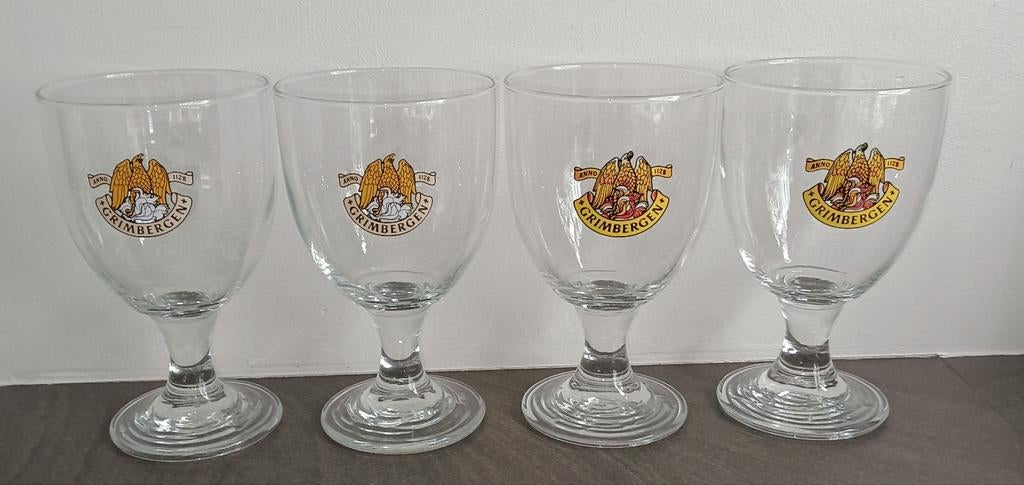Set van 4 Grimbergen bierglazen 33 cl, Ophalen of Verzenden, Zo goed als nieuw, Bierglas