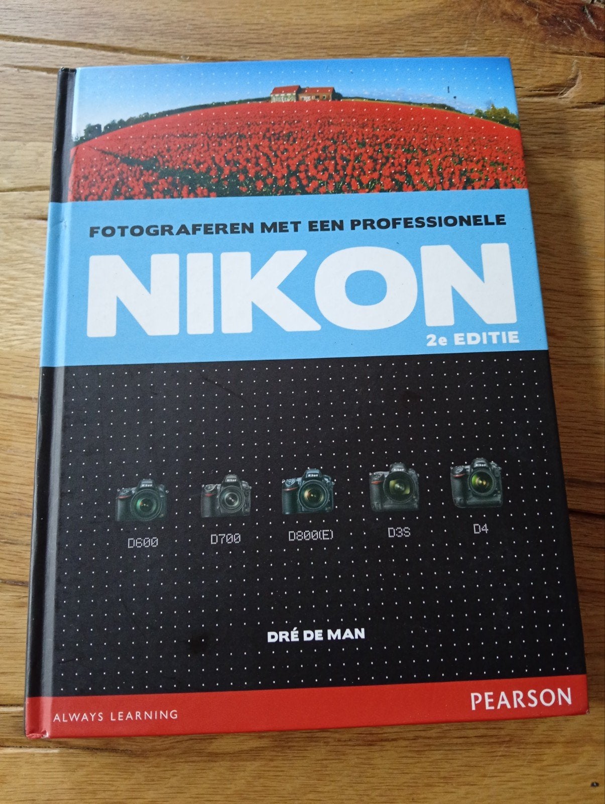 Fotograferen met een Professionele Nikon - 2e Editie, Fotografie algemeen, Ophalen of Verzenden, Zo goed als nieuw, Dré de Man