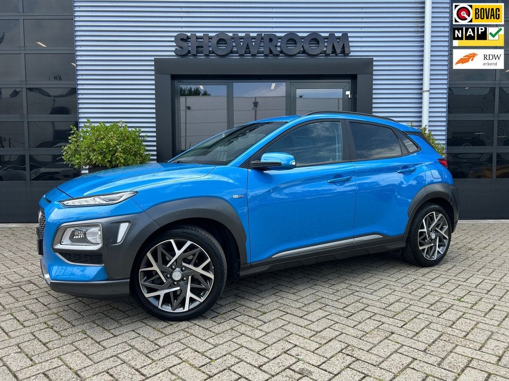 Hyundai Kona 1.6 GDI HEV Premium Automaat|Trekhaak|Camera|Na, Gebruikt, Automatische klimaatregeling, Blauw, 23 km/l