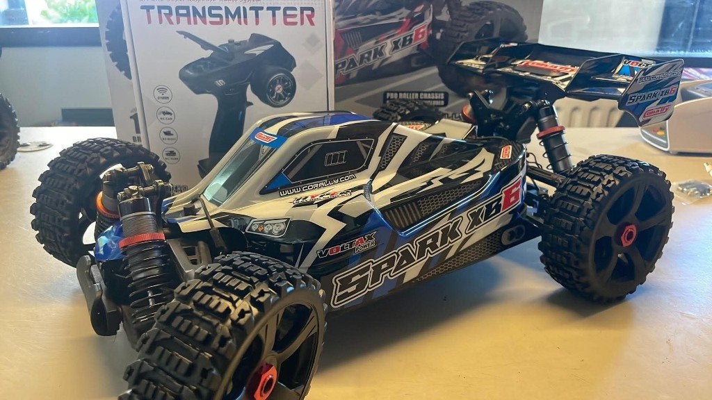 Team Corally Radix/Spark 1:8 buggy, Elektro, Auto offroad, Ophalen of Verzenden, Zo goed als nieuw