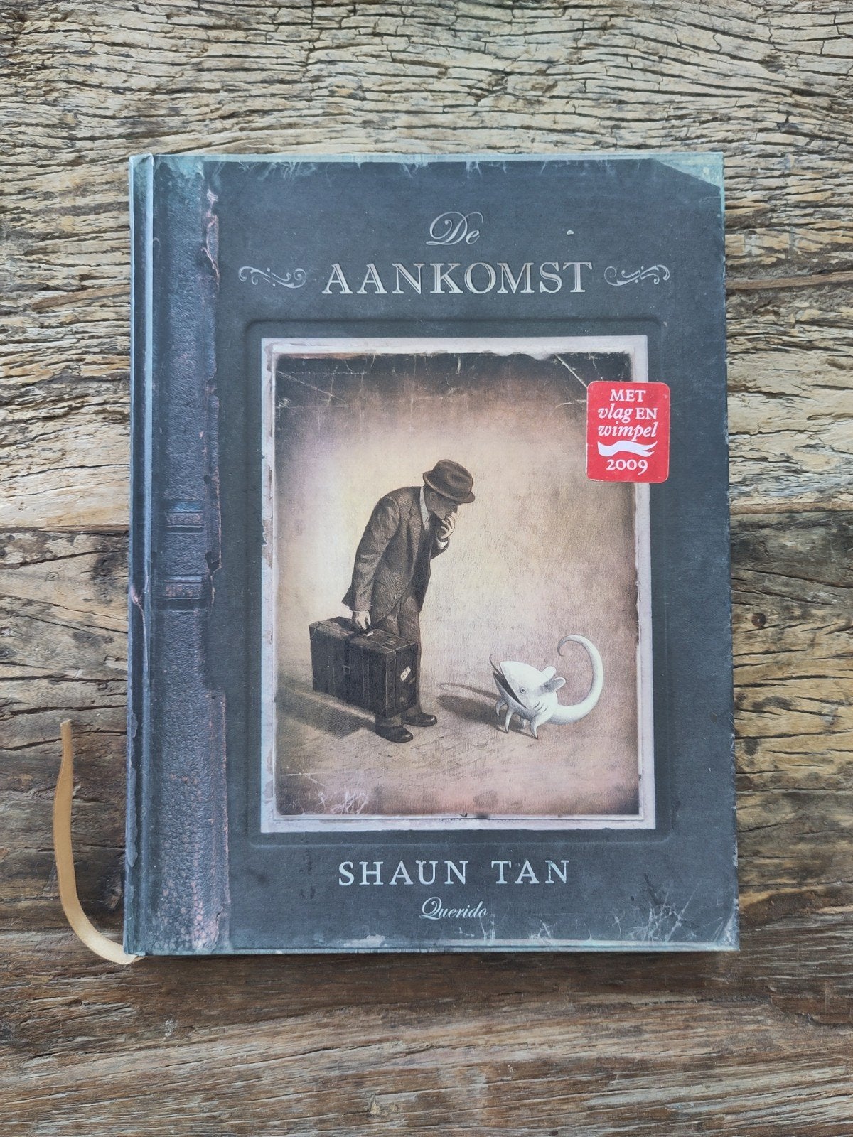 Boek Shaun Tan - De Aankomst, Boeken, Shaun Tan, Ophalen of Verzenden, Zo goed als nieuw, Prentenboek