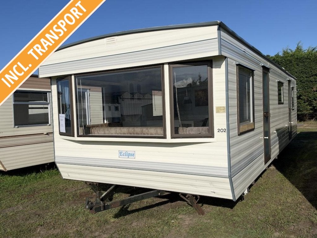 Nette stacaravan 875 x 307 cm 2 slaapkamers gratis gebracht!