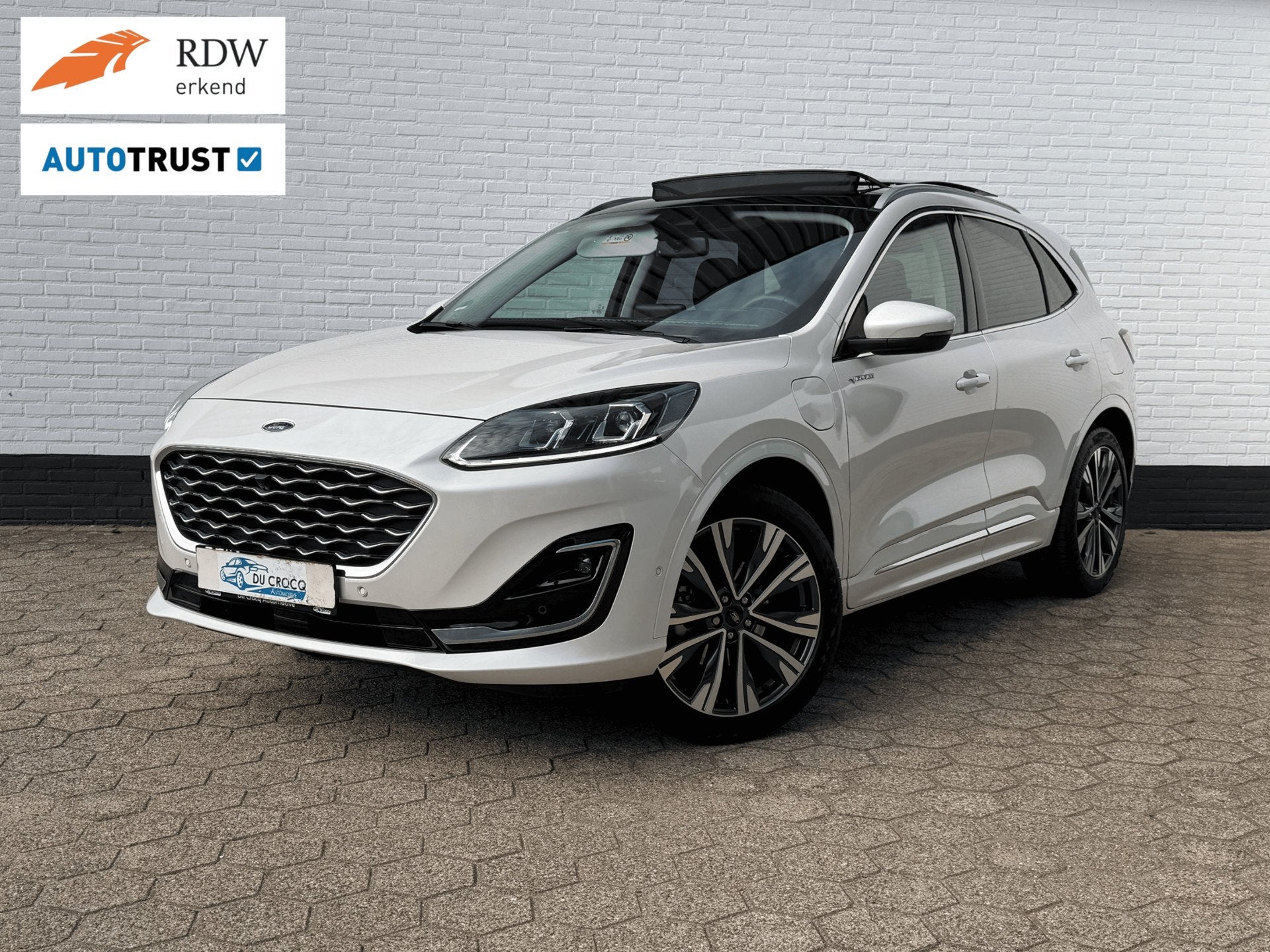 Ford Kuga 2.5 PHEV Vignale PANODAK l ACC l B&O l TREKHAAK l, Auto's, Gebruikt, Zwart, 4 cilinders, Adaptive Cruise Control