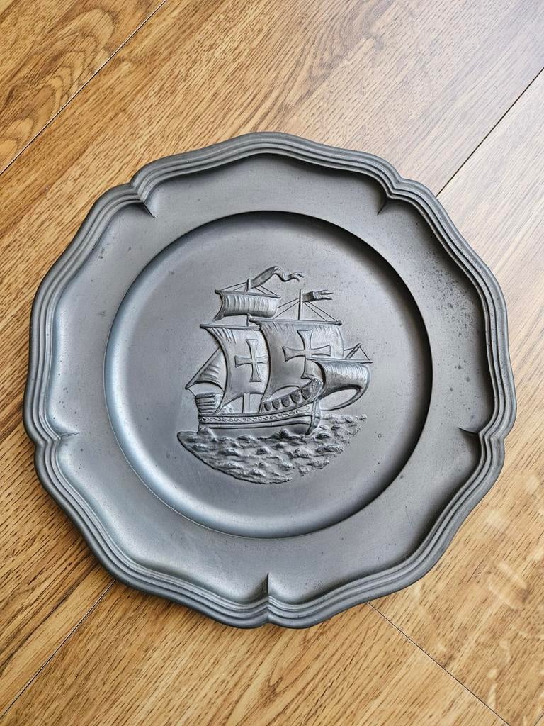 Tinnen bord middel, Ophalen