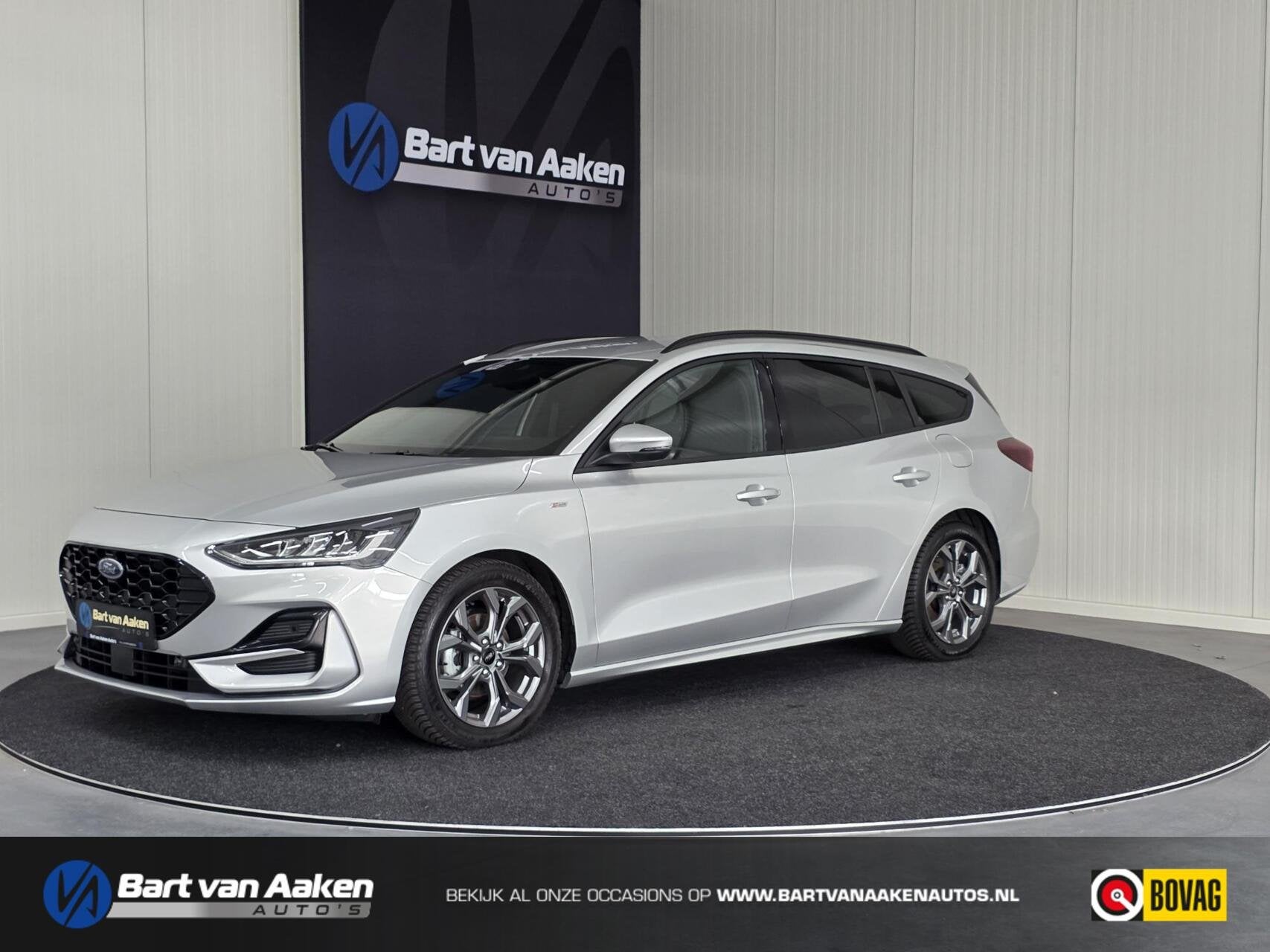 Ford Focus Wagon 1.0 Hybrid ST Line Automaat Camera Adaptive, Stof, Gebruikt, Zwart, Met garantie (alle)