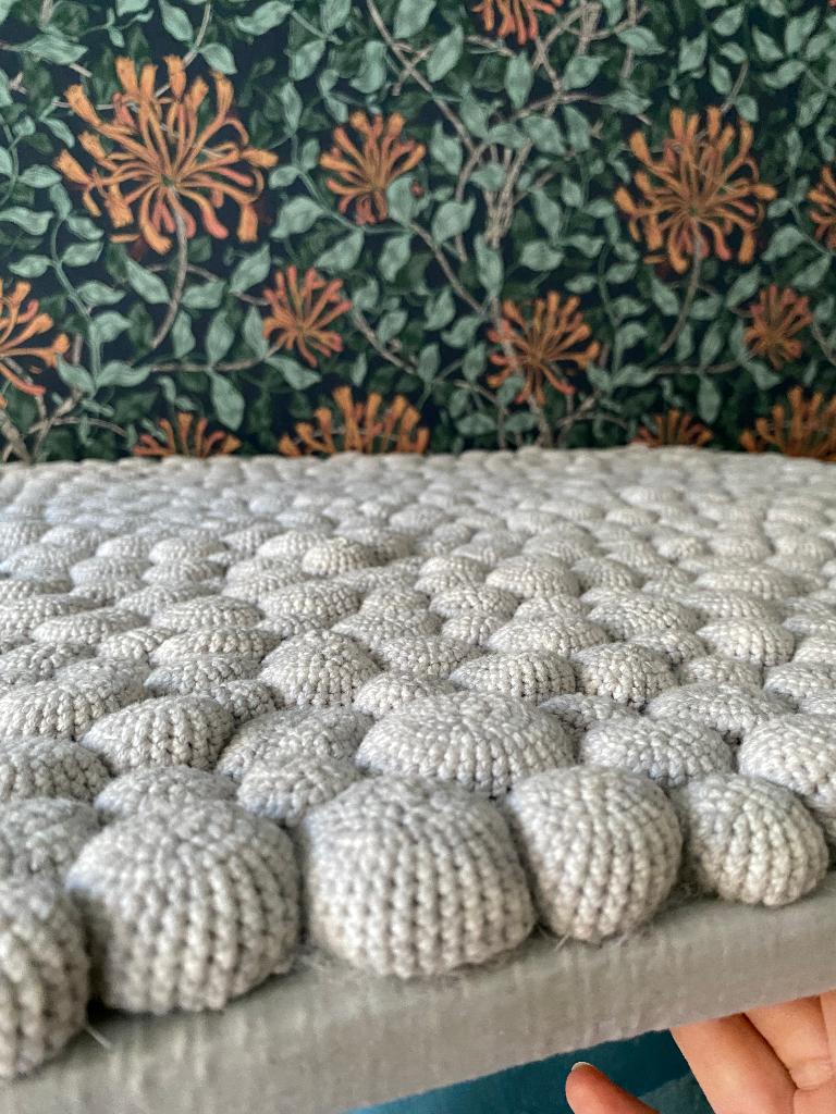 Canvas kunst object gehaakte zeeëgels, Ophalen