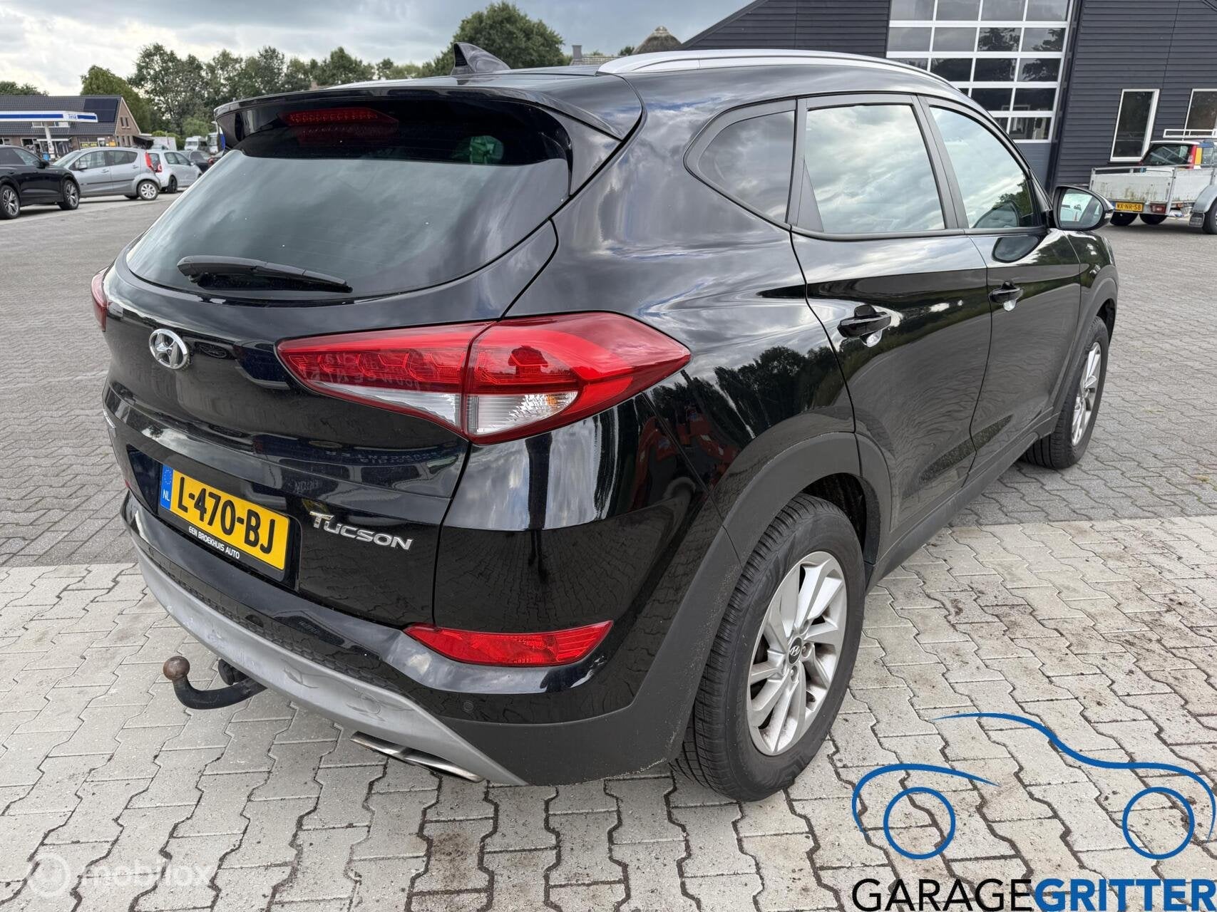 Hyundai Tucson 1.6 T-GDi Comfort, Gebruikt, 4 cilinders, Zwart, 14 km/l