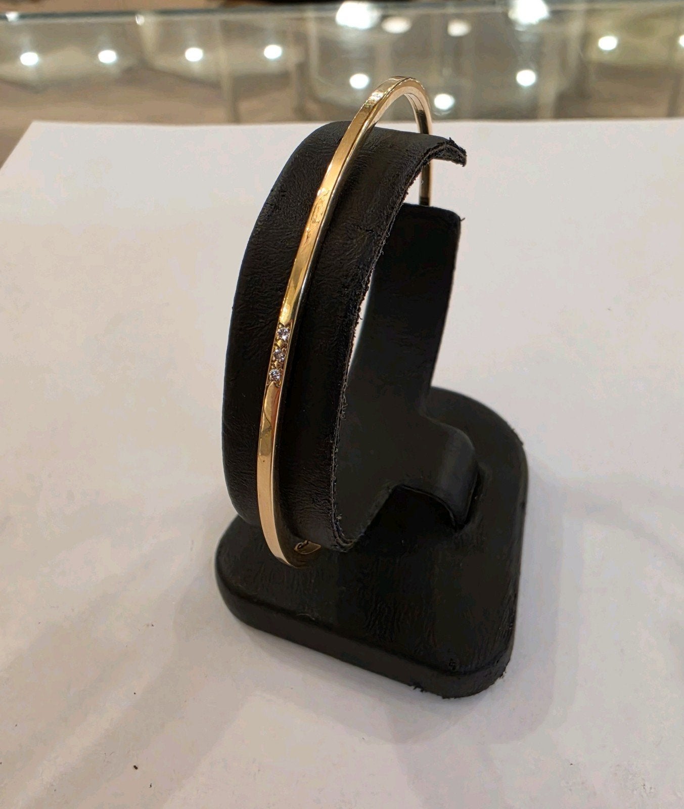 Fijne 14 karaats gouden slavenarmband / bangle met Diamant, Ophalen of Verzenden, Zo goed als nieuw, Goud, Goud
