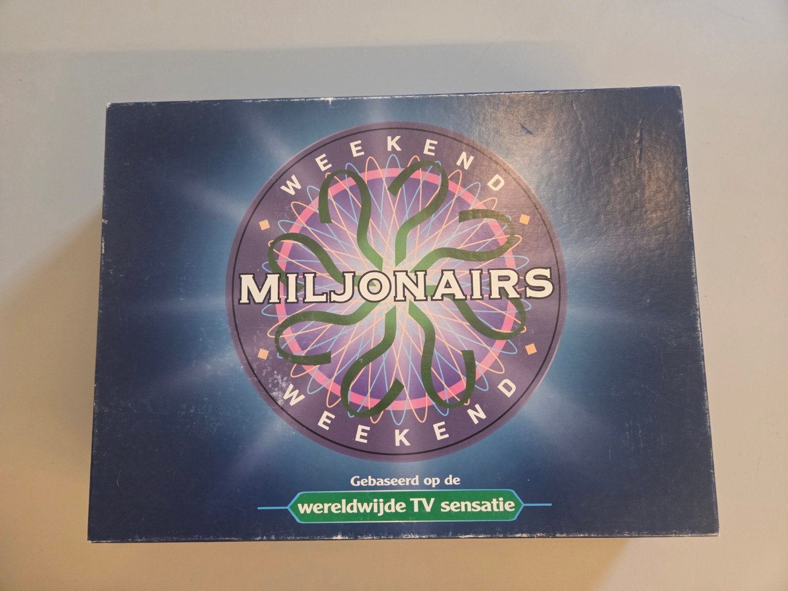 Weekend Miljonairs, Ophalen of Verzenden, Zo goed als nieuw