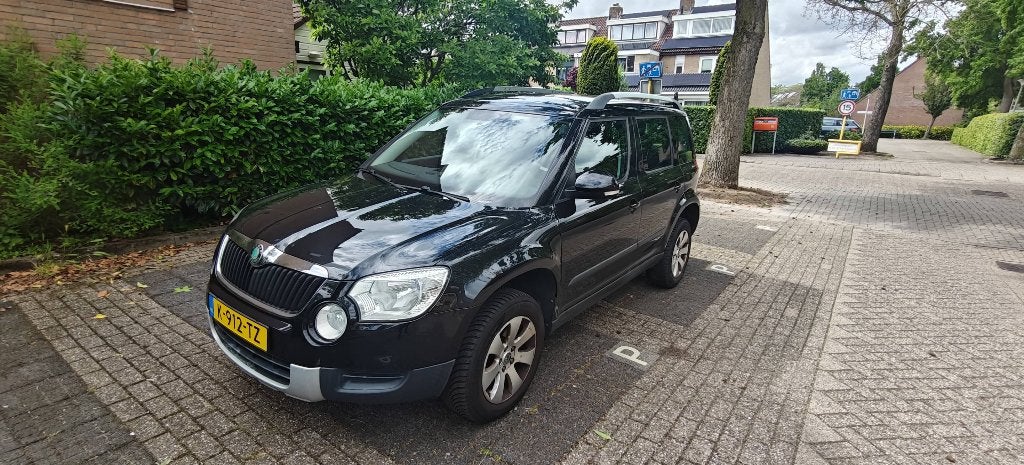 Skoda Yeti 1.2 TSI 77KW 2010 Zwart, Voorwielaandrijving, Euro 5, Stof, Zwart