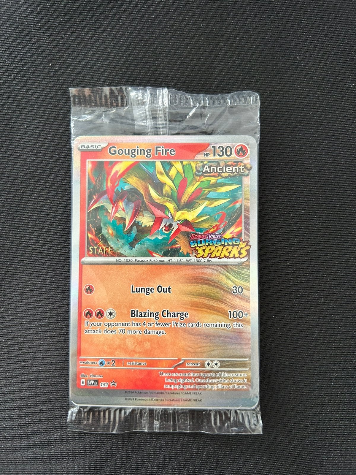 Pokemon Gouging Fire STAFF kaart sealed, Ophalen of Verzenden, Zo goed als nieuw