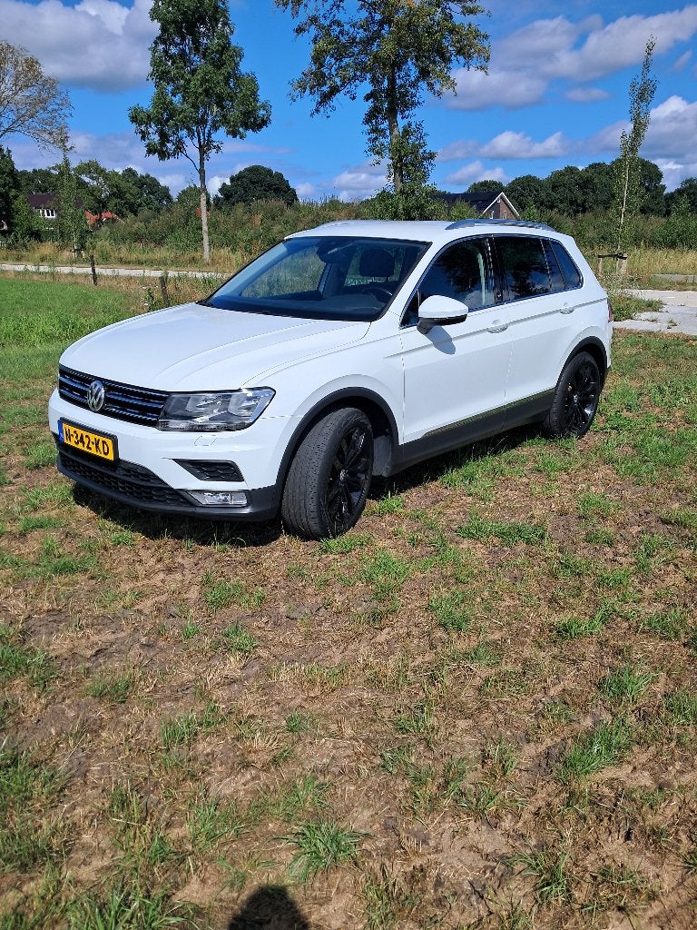Volkswagen Tiguan Sound 1.4 TSI  2017  Wit, Voorwielaandrijving, Lichtsensor, Stof, 1800 kg