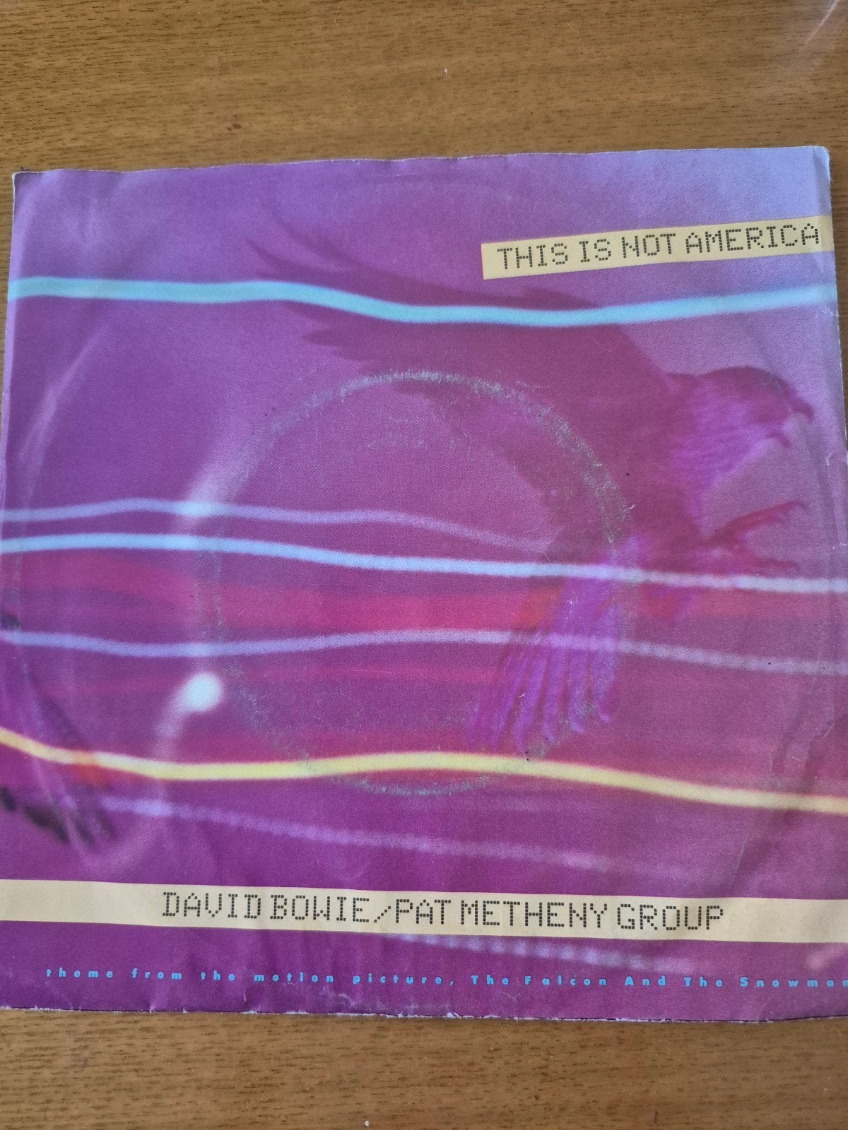David Bowie / Pat Metheny Group - This Is Not America 7", Gebruikt, Fotohoes, 7 inch, Ophalen of Verzenden