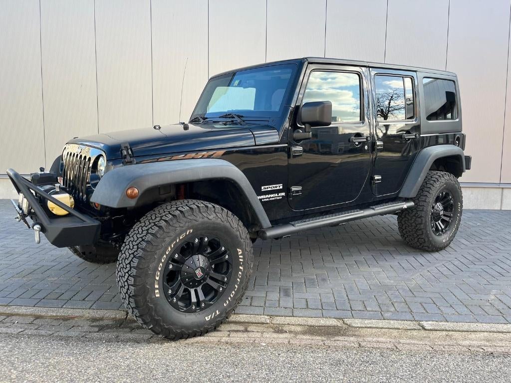 Jeep Wrangler 2.8 CRD Unlimited AUT 2011 Zwart, Auto's, Jeep, 450 kg, 241 €/maand, Zwart, 1000 kg