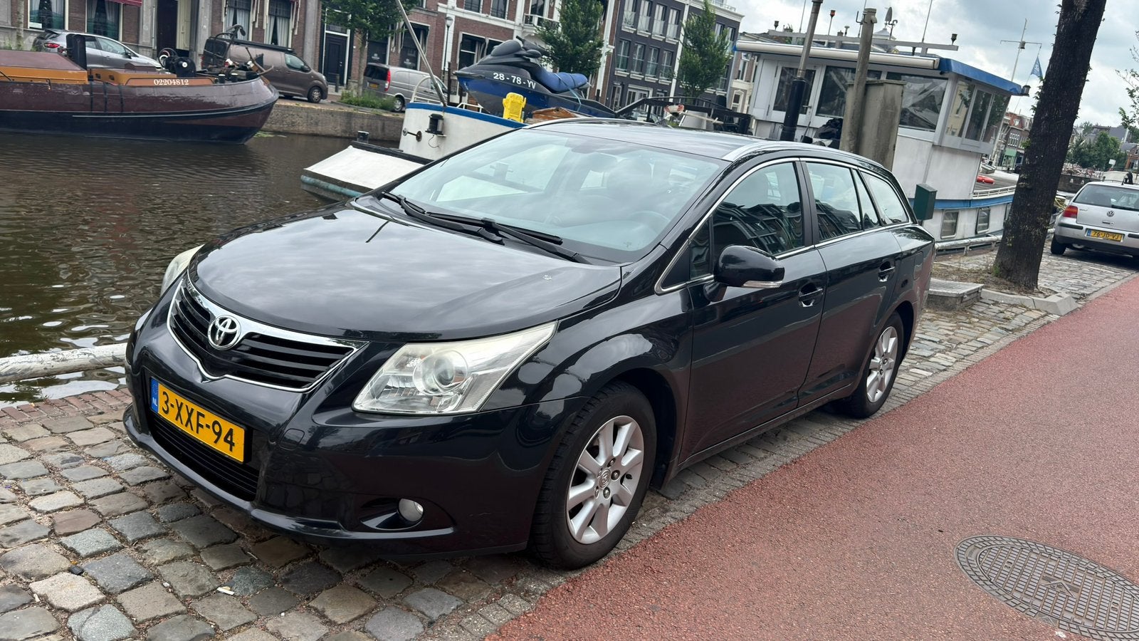 Toyota Avensis 1.8 Vvt-i Wagon 2009 Zwart, Auto's, 15 km/l, Avensis, 4 cilinders, Zwart
