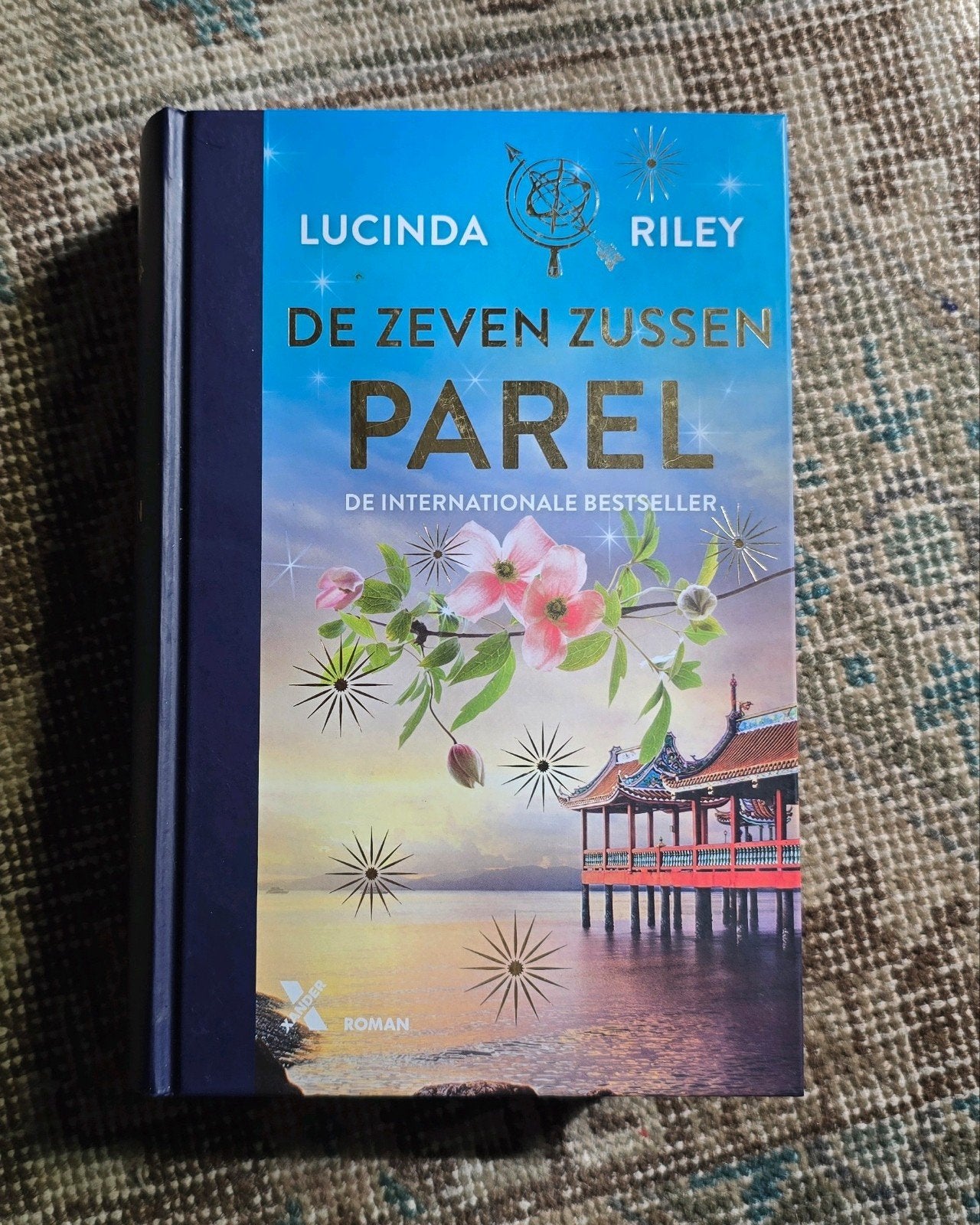 De Zeven Zussen - Parel (hardcover), Boeken, Ophalen of Verzenden, Zo goed als nieuw