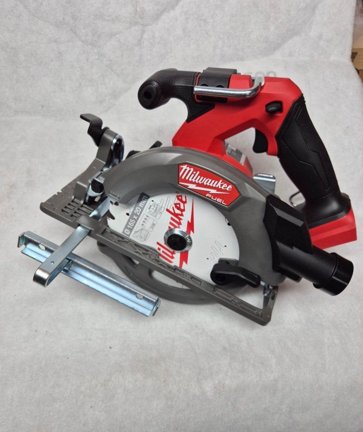 Milwaukee Accu Cirkelzaag M18 CCS55-0 accu + lader, Ophalen, Cirkelzaag, Zo goed als nieuw, 30 tot 70 mm