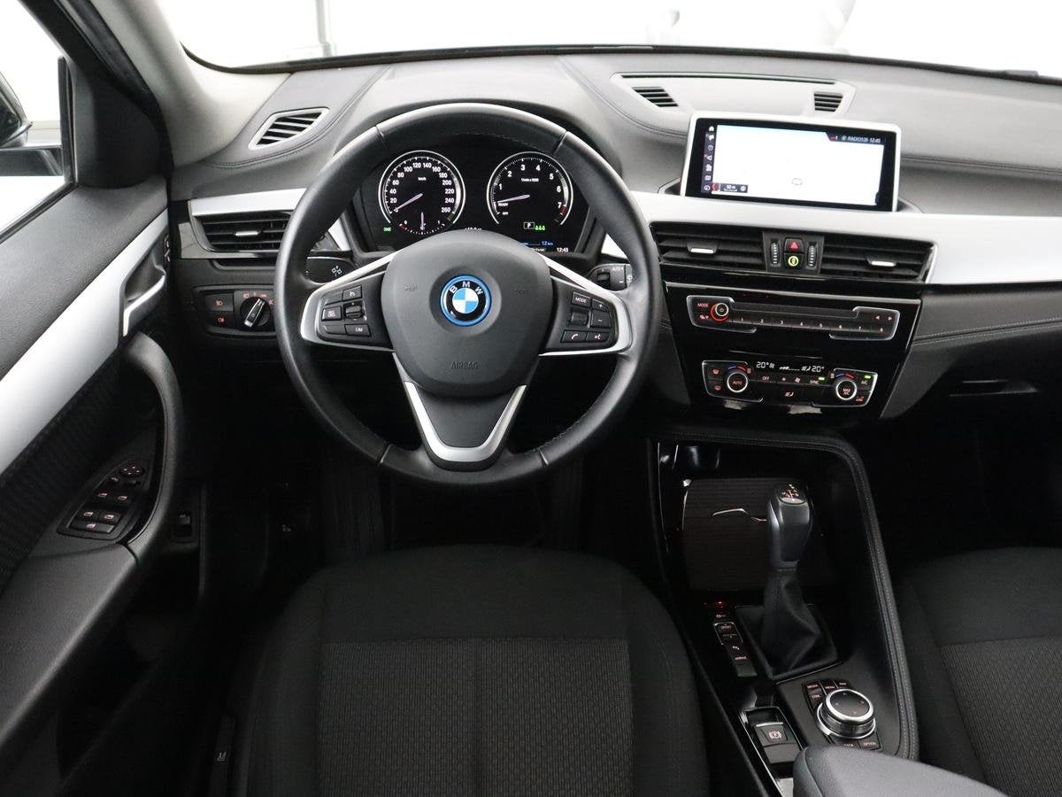 BMW X2 xDrive25e Executive | SOH 86,3% | Camera | Navigatie, Auto's, Automaat, Gebruikt, Euro 6, Zwart
