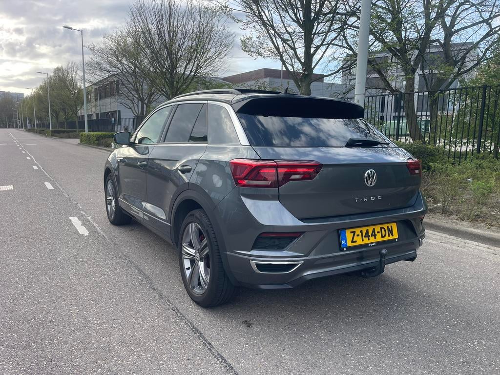Volkswagen T-Roc 1.5 TSI 150pk 7-DSG 2019 Grijs Panoramadak, Auto's, 1498 cc, Euro 6, 4 cilinders, Leder en Stof