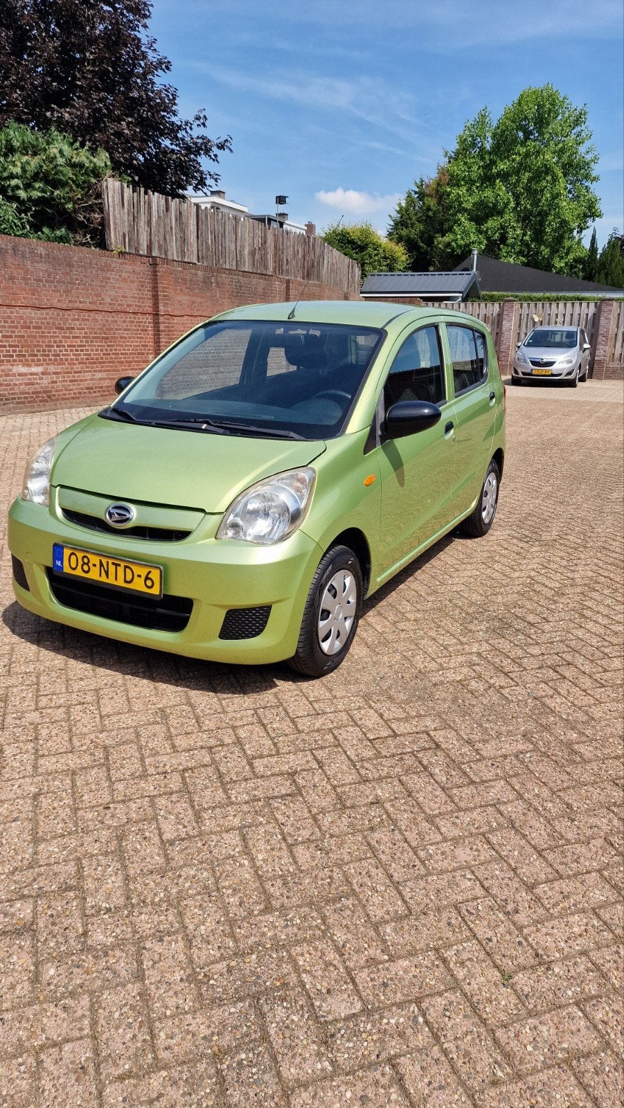 Daihatsu Cuore 1.0 5D 2010 Groen, Auto's, Daihatsu, Voorwielaandrijving, Stof, 600 kg, Zwart