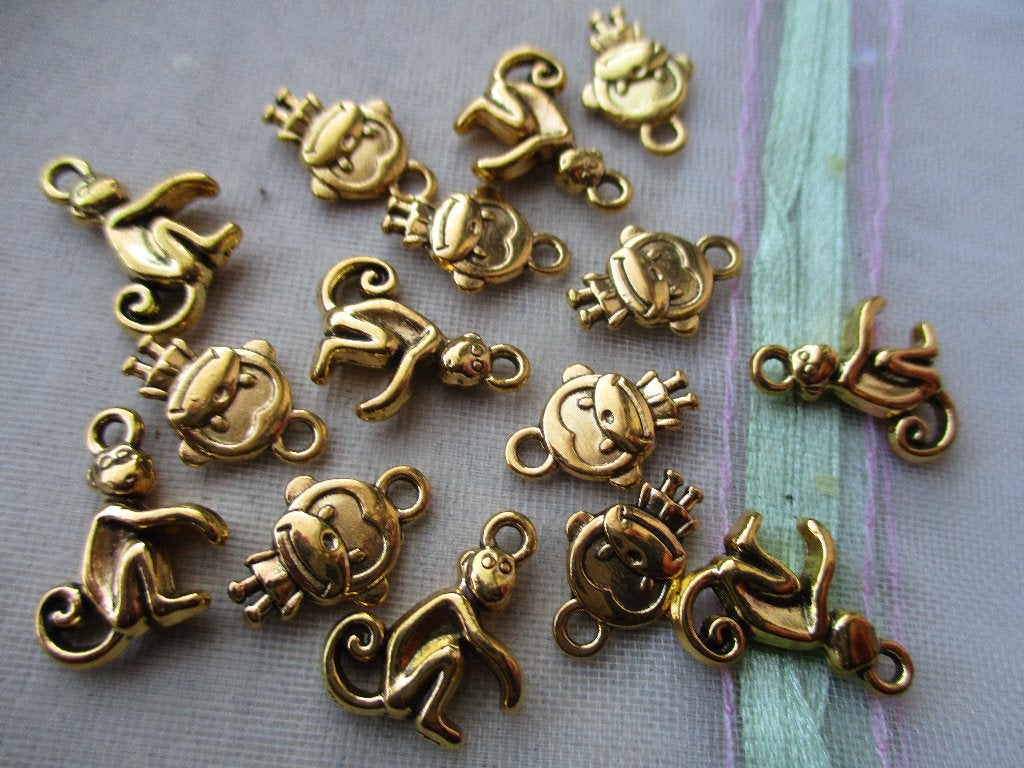 855/ grappige gold plated tibetiaanse aapjes bedels, Ophalen of Verzenden, Nieuw, Bedel