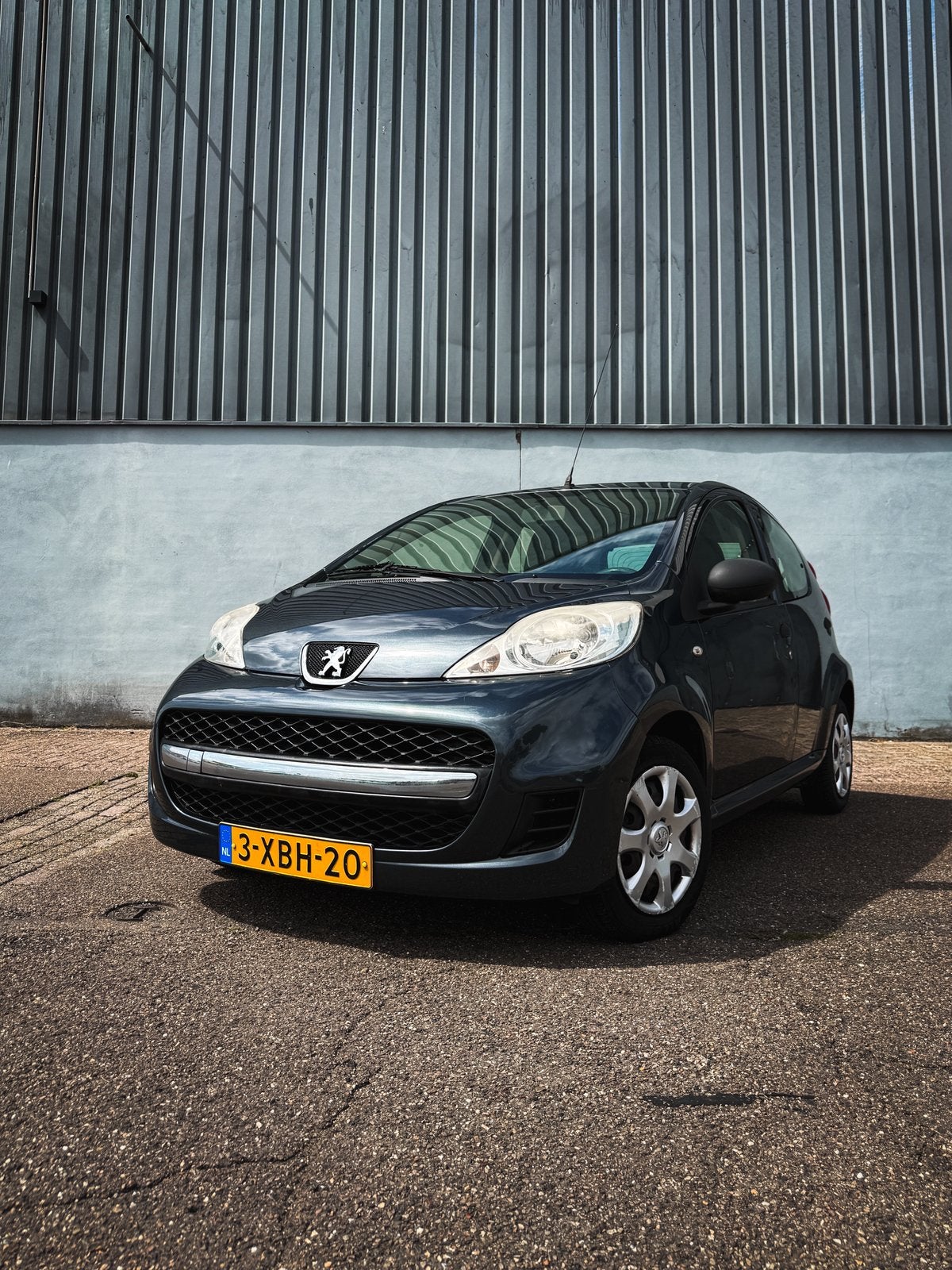 Peugeot 107 1.0 5DR 2012 Grijs NETJES! SPOTPRIJS!, Auto's, Voorwielaandrijving, Euro 5, Stof, Zwart