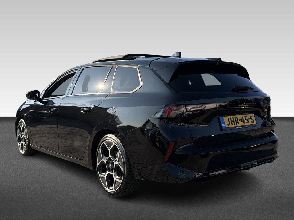 Opel Astra Sports Tourer 1.2 Turbo Ultimate, Auto's, Automaat, Lichtsensor, 1199 cc, Alcantara