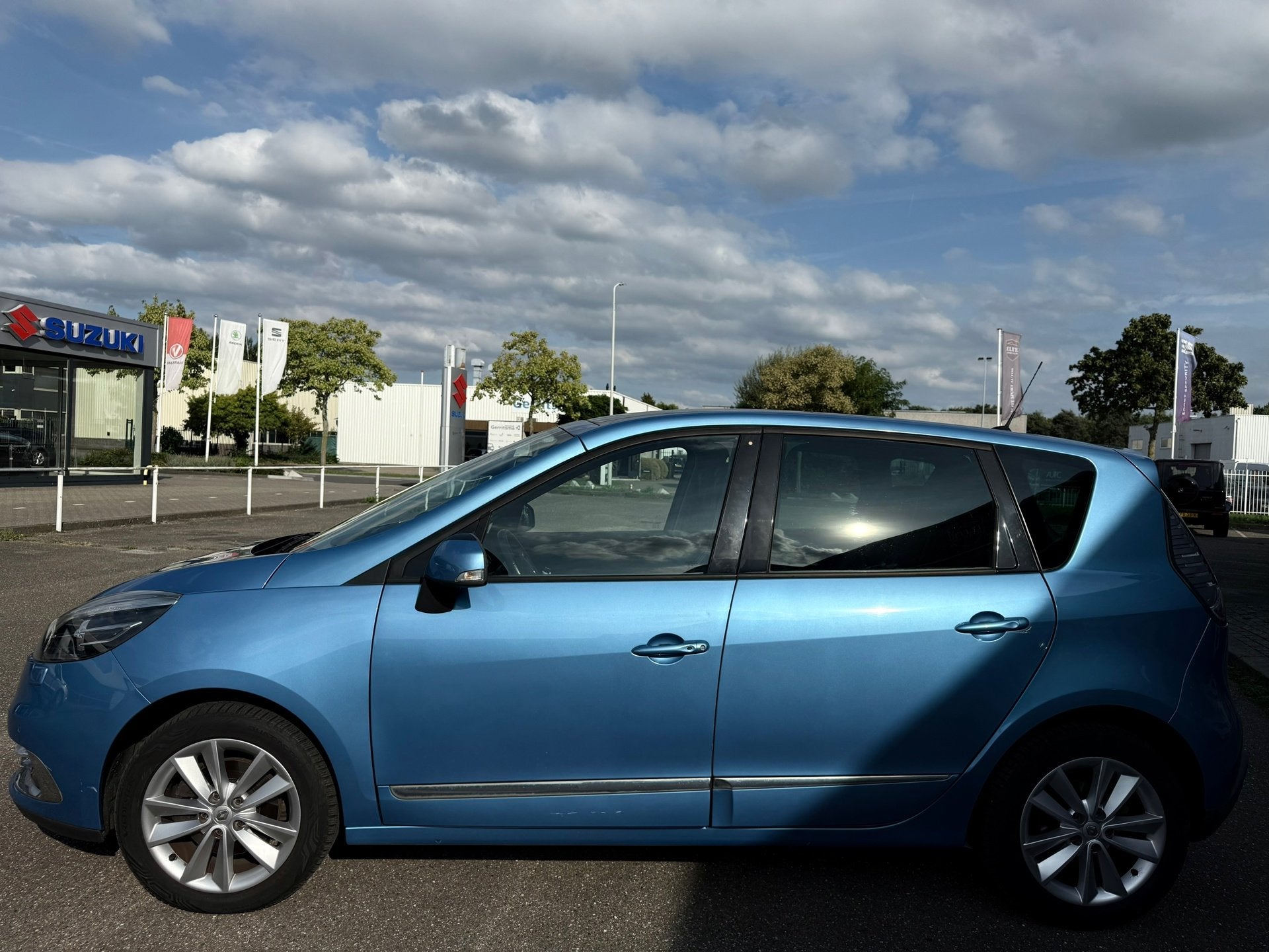 Renault Scénic 1.2 TCe Privilege I Pano I Achteruitrijcamer, Auto's, Voorwielaandrijving, Euro 5, Gebruikt, 4 cilinders