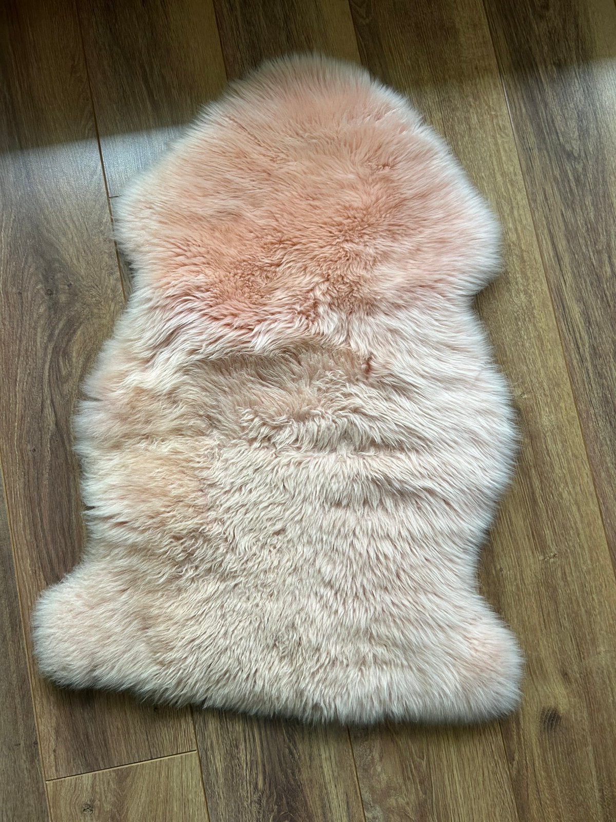 Roze schapenvacht, Ophalen, Gebruikt