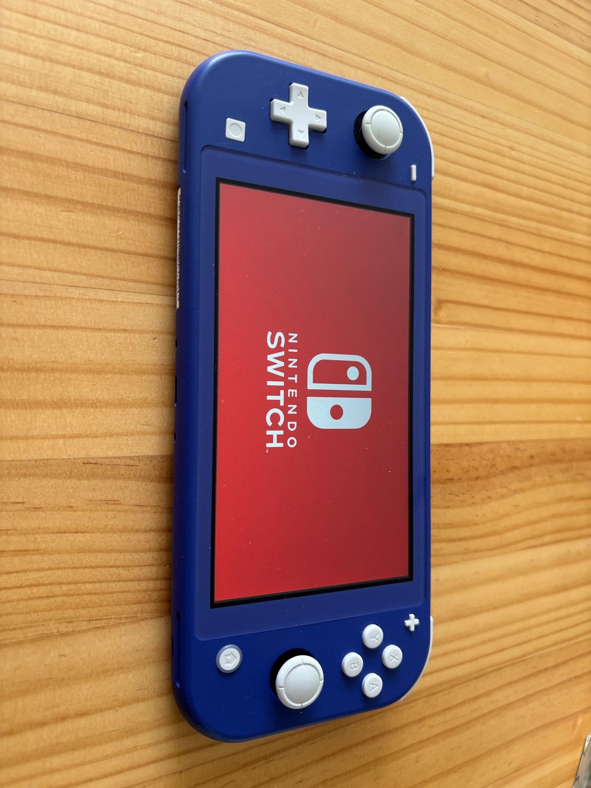 Nintendo Switch Lite Blauw + 64GB SD kaart, Ophalen of Verzenden, Overige kleuren, Zo goed als nieuw