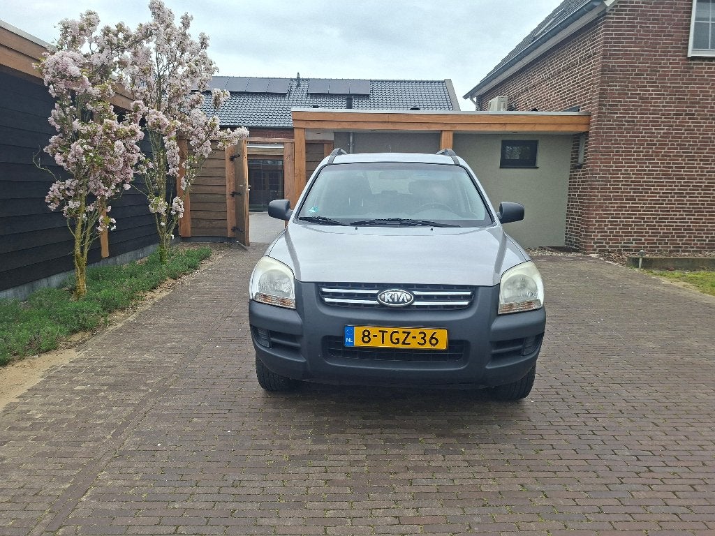 Kia Sportage 2.0 2WD 2007 Grijs, Auto's, Kia, 1442 kg, Zwart, 4 cilinders, Bluetooth