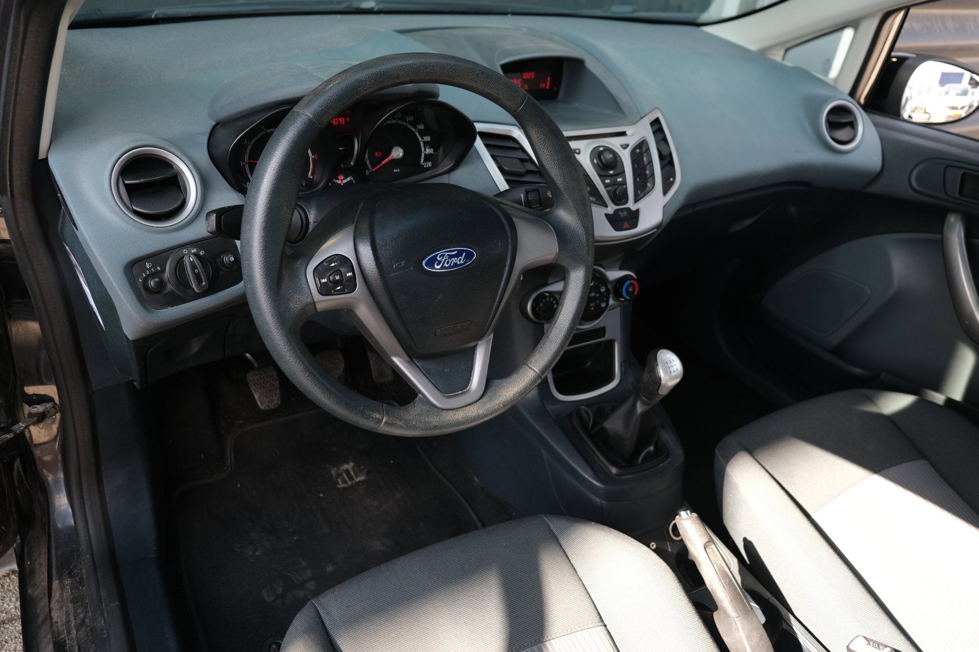 Ford Fiesta 1.25 Limited 60PK Airco, Auto's, Ford, Voorwielaandrijving, Euro 5, Stof, 4 cilinders