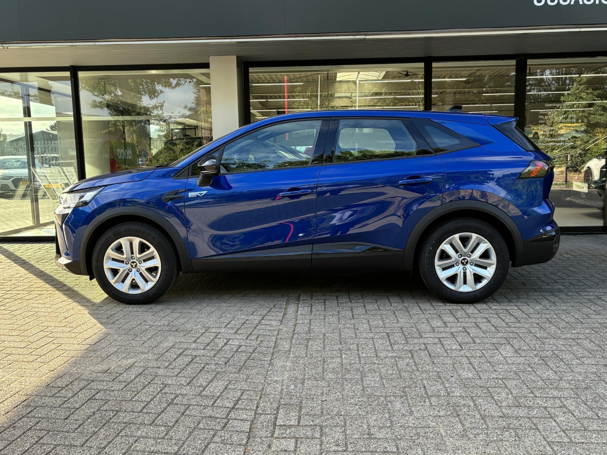 Mitsubishi Grandis 1.8 HEV Intense NIEUW UIT VOORRAAD LEVERB, Auto's, Stof, 1789 cc, Met garantie (alle), Blauw
