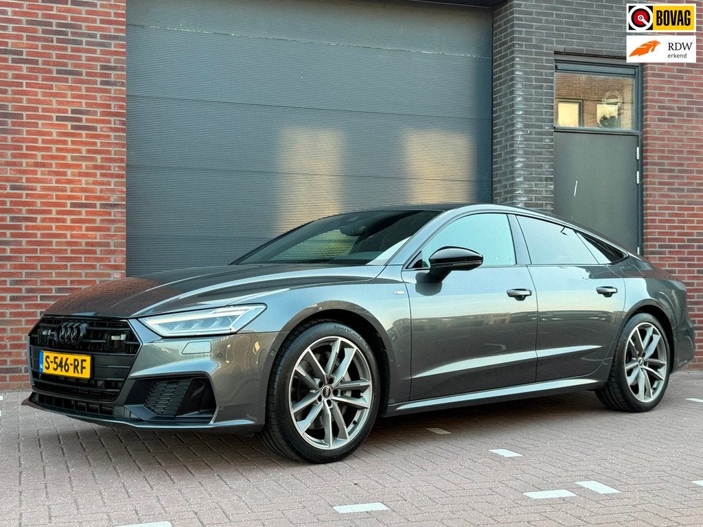 Audi A7 Sportback 50 TFSI e Quattro Pro Line S, Daytona Grij, Auto's, Audi, Gebruikt, 4 cilinders, 4 stoelen, Leder en Stof