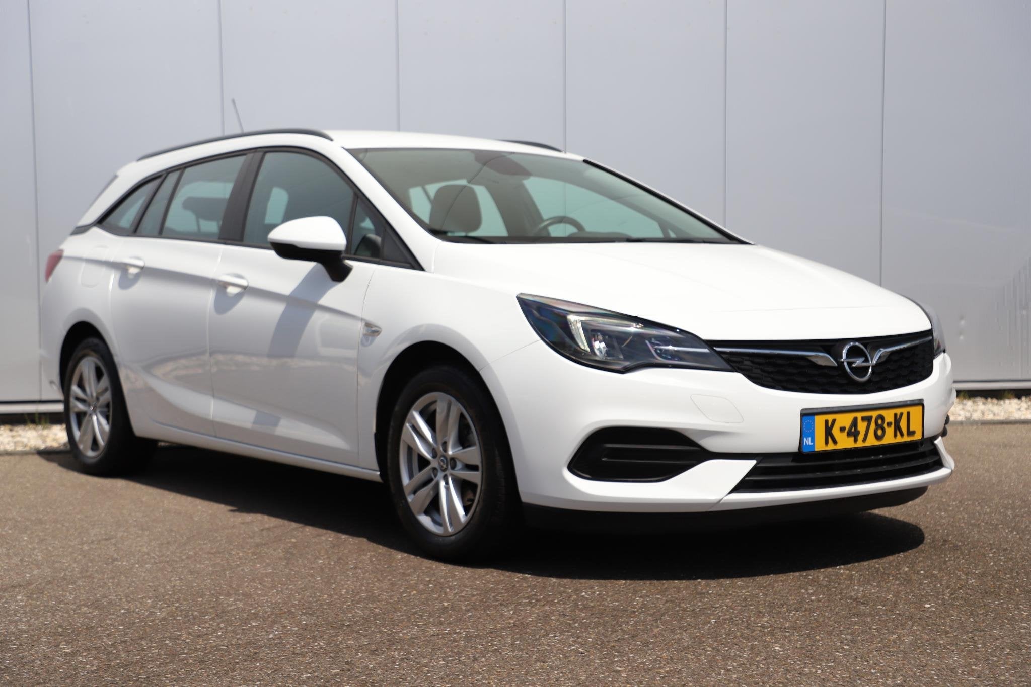 Opel Astra Sports Tourer 1.2 Edition 110PK Trekhaak Navigati, Auto's, Voorwielaandrijving, Stof, Gebruikt, 1199 cc