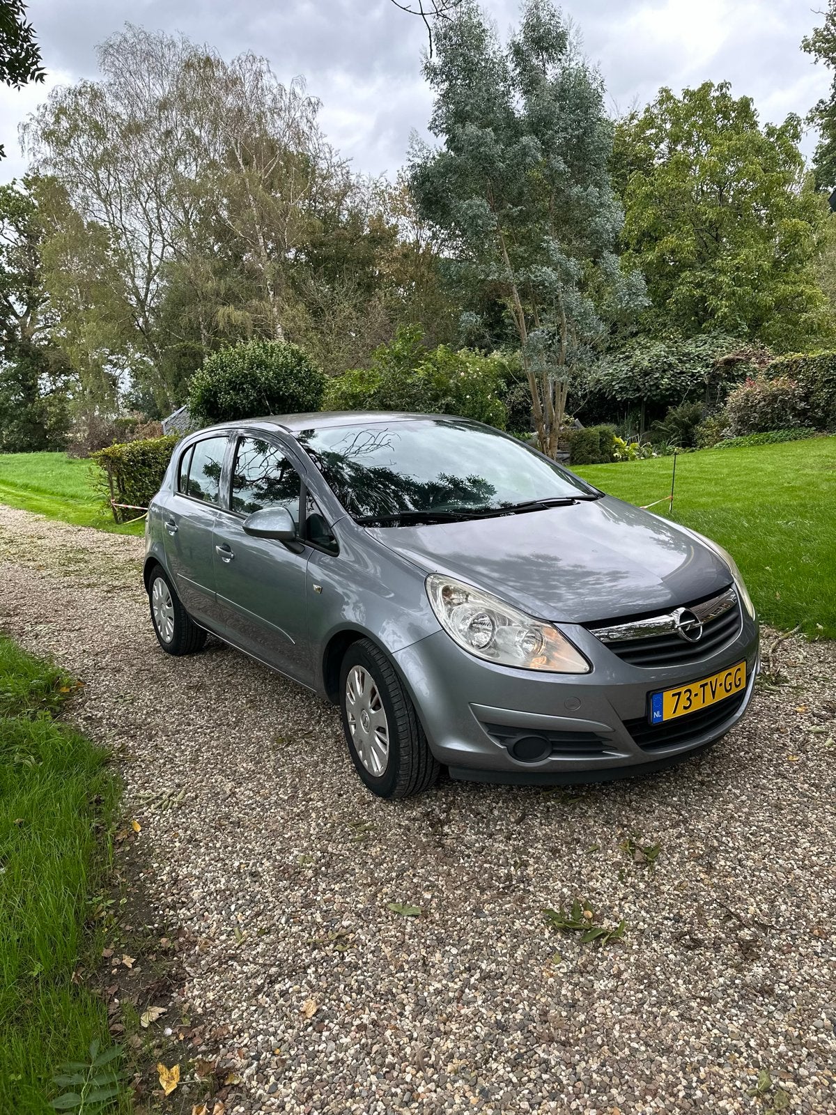 Opel Corsa 1.2 16V / 5D WR 2007 Grijs - Energieklasse B, Voorwielaandrijving, Stof, 4 cilinders, 1229 cc