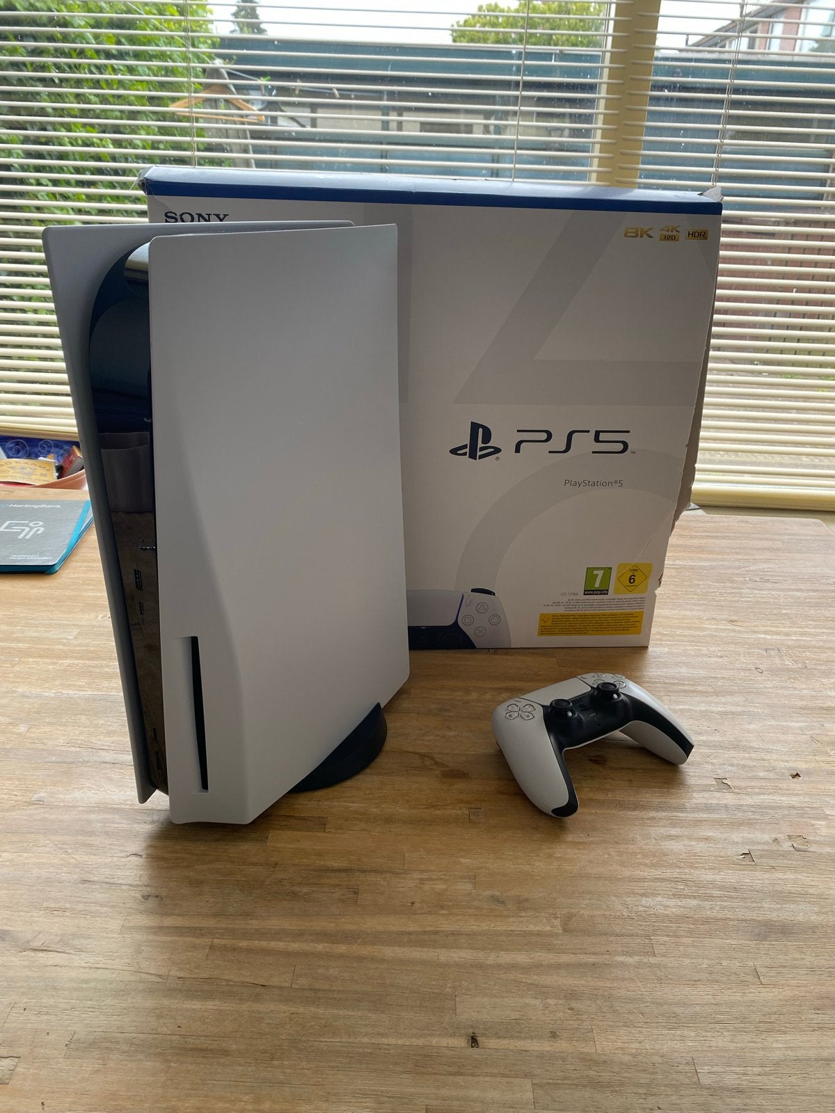 PlayStation 5 Disc Edition met 2 games en controller, Ophalen of Verzenden, Zo goed als nieuw, Playstation 5