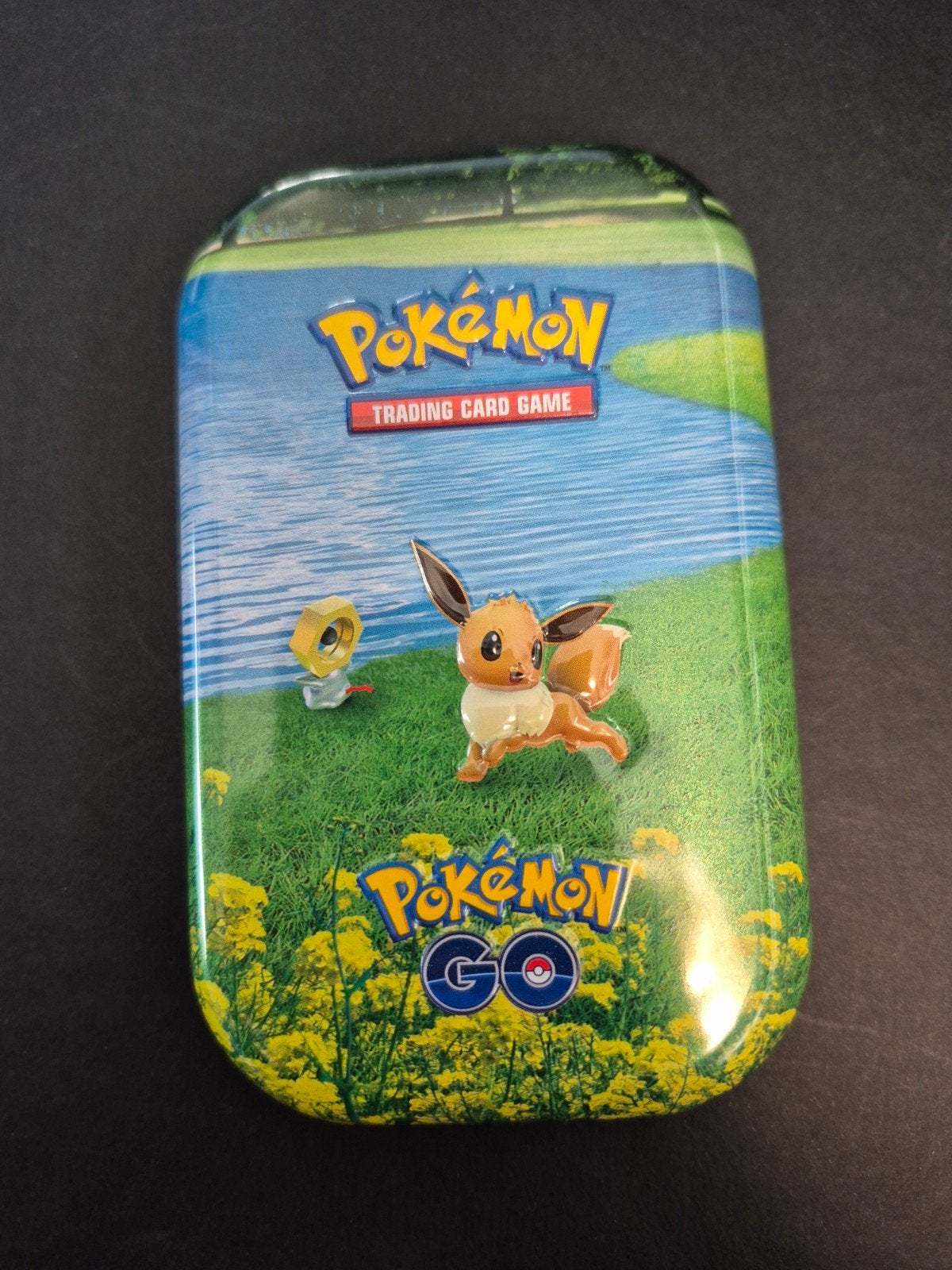 Pokémon Go Eevee Tin Box met boekje, Ophalen of Verzenden, Gebruikt, Overige typen