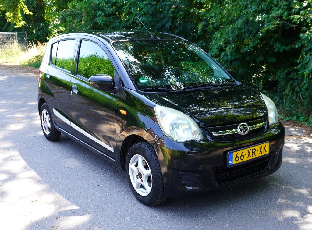 Daihatsu Cuore 1.0-12V Premium '07, vele opties, apk 04-2027, Auto's, Daihatsu, Voorwielaandrijving, Stof, Metallic lak, Cuore
