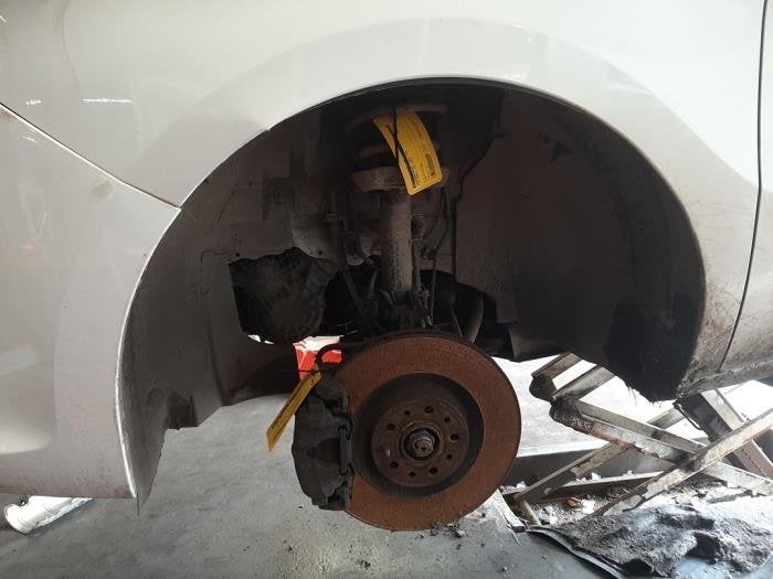 Schokdemperpoot links-voor van een Fiat Doblo, Gebruikt, -, -, Ophalen of Verzenden