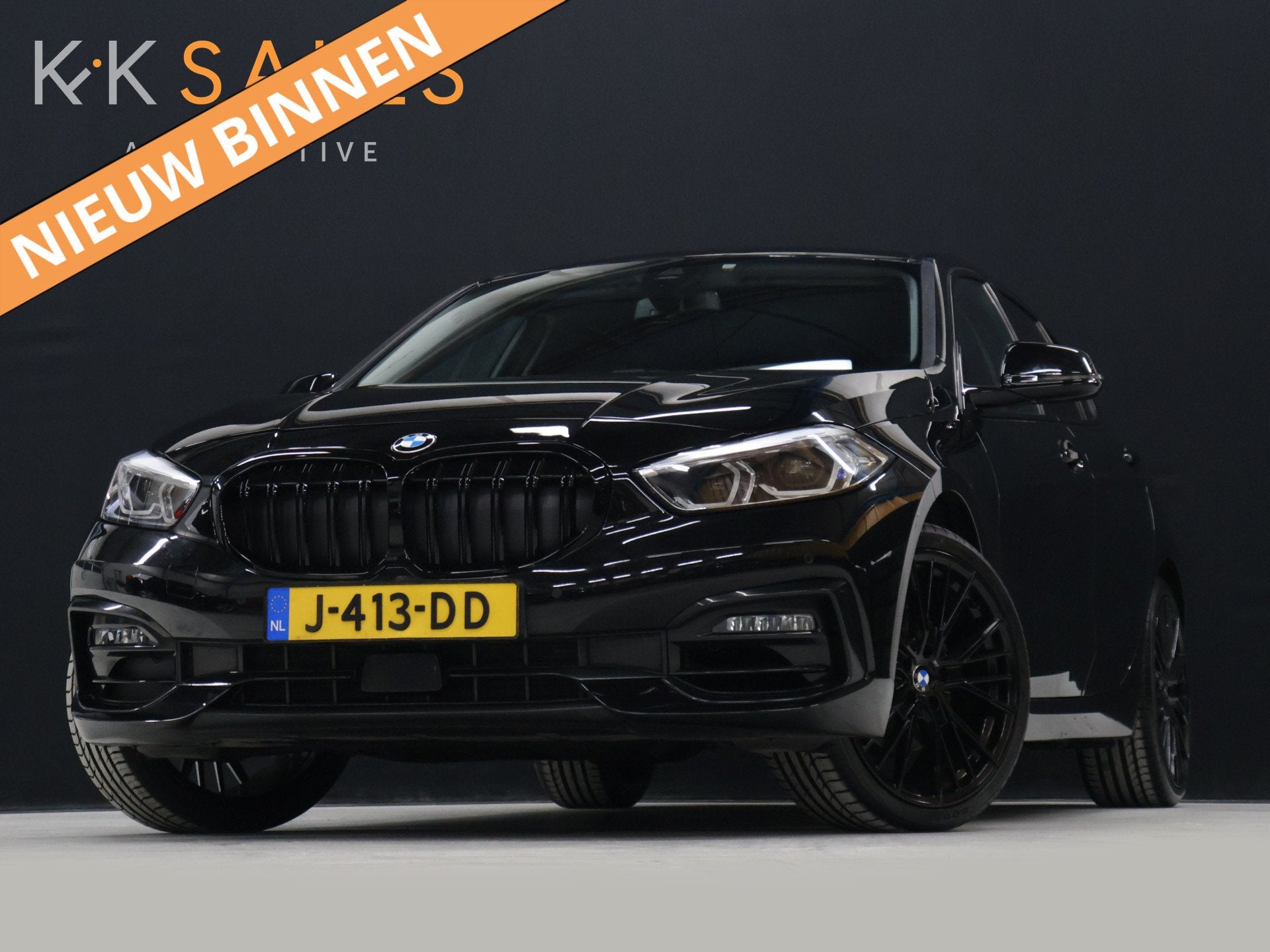 BMW 1-serie 118i Executive Edition [AFNEEMBARE TREKHAAK, APP, Auto's, Dealer onderhouden, Gebruikt, Leder en Stof, Zwart