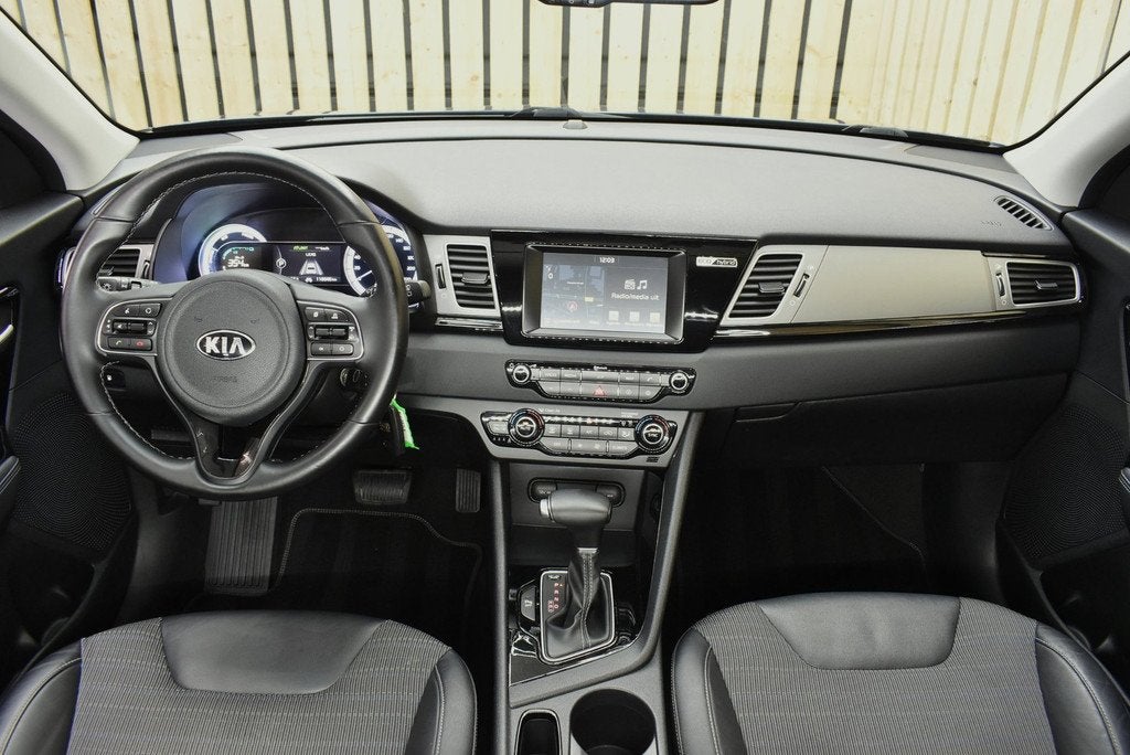 Kia Niro 1.6 GDi Hybrid First Edition Trekhaak CarPlay 116dk, Auto's, Gebruikt, Euro 6, Parkeersensor, Blauw