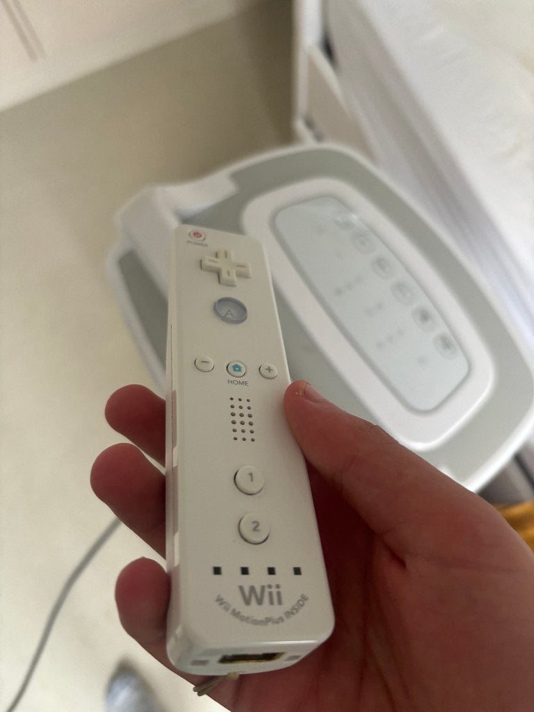 original wii remote with wii motion plus, Spelcomputers en Games, Ophalen of Verzenden, Zo goed als nieuw, Draadloos, Wii-mote of Nunchuck