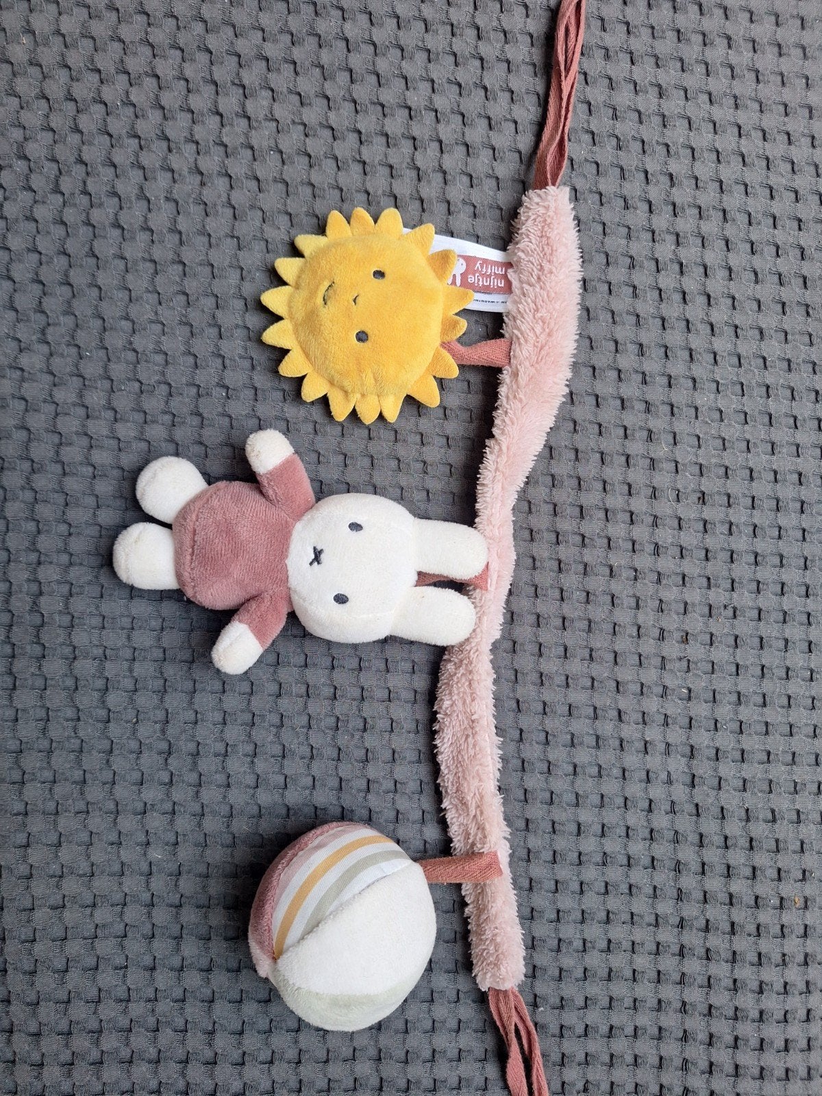 Originele Nijntje kinderwagenspanner met zon en rammelaar, Ophalen of Verzenden, Zo goed als nieuw, Mobiel, Met geluid