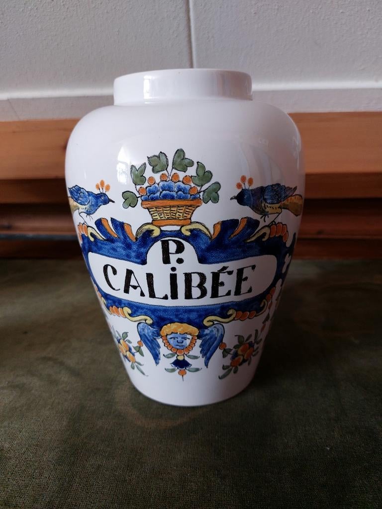 Oude apotheek pot P. CALIBÉE, Ophalen