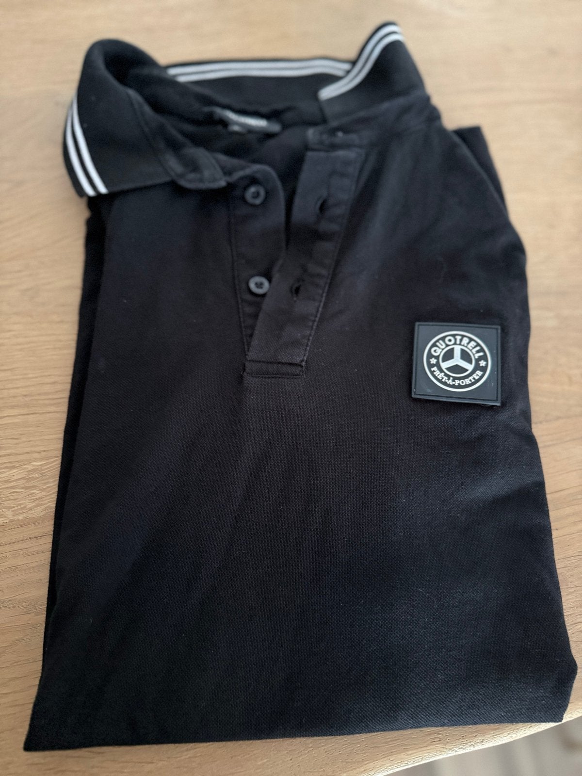 Zwarte Qoutrell polo - Maat XL - Zeer goede staat, Kleding | Heren, Ophalen of Verzenden, Zo goed als nieuw, Maat 56/58 (XL), Zwart