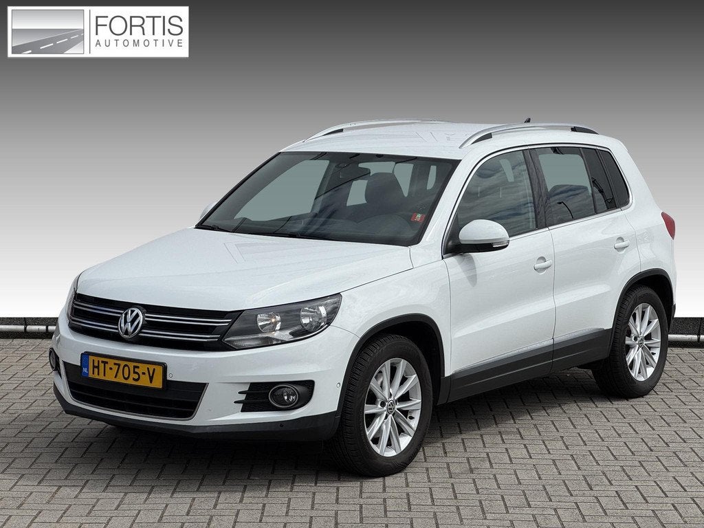 Volkswagen Tiguan 1.4 TSI Sport&Style NL-AUTO | TREKHAAK 180, Voorwielaandrijving, Euro 5, 15 km/l, Zwart